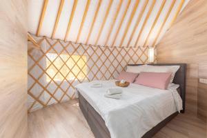 Voodi või voodid majutusasutuse L.stile Glamping toas