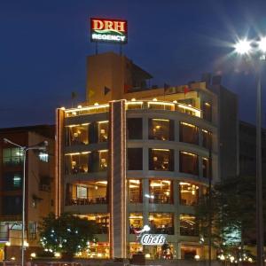 a building with a drifel sign on top of it at HOTEL RK REGENCY in Ahmedabad