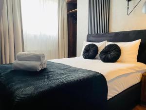 מיטה או מיטות בחדר ב-Hotel Millennium