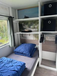 Postel nebo postele na pokoji v ubytování RBR 168 - Beach Resort Kamperland