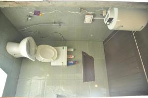 Vannituba majutusasutuses HimtrekStays Sethan, Heritage House, Manali