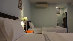 Легло или легла в стая в Mango Bedroom Inn