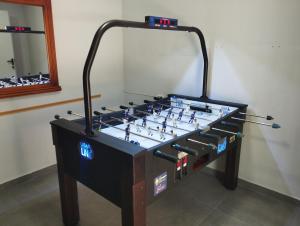a foosball game on a table in a room at Casa rural miralmonte in Moratalla