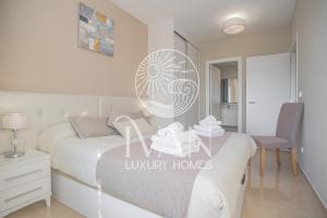 Postel nebo postele na pokoji v ubytování Casa Ralf Ivan Luxury Homes 9ªPlta Sur 1ªLinea
