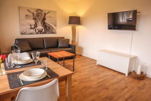 Ruang duduk di Zentrales Appartement im Alpin-Style in Garmisch