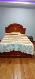 En eller flere senge i et værelse på Suite Privada Riobamba