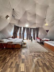 Katil atau katil-katil dalam bilik di LivingStone Snow Region Campsite