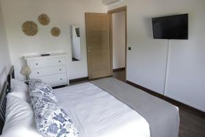 Postel nebo postele na pokoji v ubytování B&B Valleluna