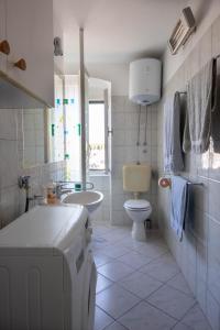 Kúpeľňa v ubytovaní Villa Cindro Apartments