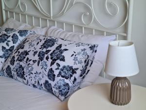 Postel nebo postele na pokoji v ubytování B&B Valleluna