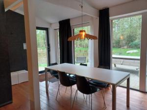 Posezení v ubytování De Vijver + 20 fotografií