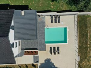 an overhead view of a building with a swimming pool at Villa Luana in Ludbreg
