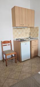 Kuchyň nebo kuchyňský kout v ubytování Amalia Studios + 10 fotografií