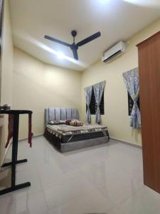 Χώρος καθιστικού στο Homestay Gerbang Desa Seri Iskandar