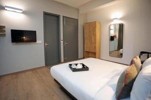 Postel nebo postele na pokoji v ubytování Hotel Wedlock 38 + 18 fotografií