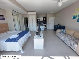 Postel nebo postele na pokoji v ubytování Book Santos - Condomínio Unlimited - Apartamento com Vista Mar e Apartamento com Vista Piscina