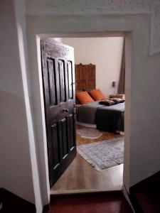Postel nebo postele na pokoji v ubytování chambres d'hôtes l'atrium