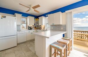 Kuchyň nebo kuchyňský kout v ubytování Sun Trippin'