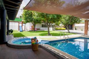 Πισίνα στο ή κοντά στο Amazing family house in Oaxtepec Pool & Hot tub