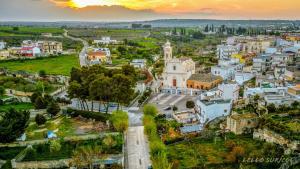 an aerial view of a city at sunset at Casa vacanze Margherita in Laterza