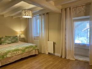 Postel nebo postele na pokoji v ubytování Apartamentos Calm & Nature - Adults Only