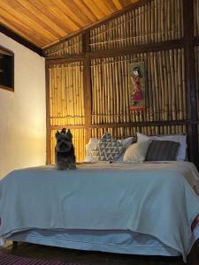 Cama ou camas em um quarto em Chalé na Montanha