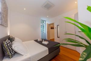 Postel nebo postele na pokoji v ubytování Love of Lugano - Happy Rentals