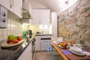 Kuchyň nebo kuchyňský kout v ubytování Casa Tamè - Happy Rentals