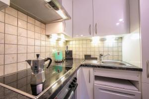Kuchyň nebo kuchyňský kout v ubytování Casa Tamè - Happy Rentals