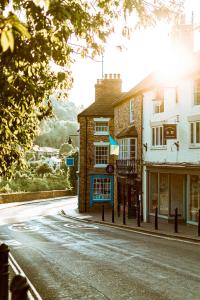 a street with a building on the side of the road at Stone Cottage. Full of character barn conversion Pass the Keys in Highley