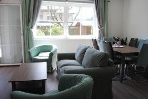 Posezení v ubytování Ferienwohnung mit Pool in Wörthersee Nähe