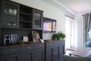 Kuchyň nebo kuchyňský kout v ubytování Ferienwohnung mit Pool in Wörthersee Nähe + 21 fotografií
