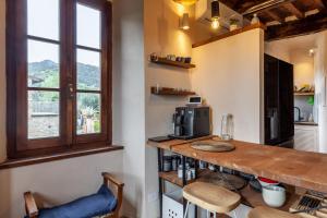 Η κουζίνα ή μικρή κουζίνα στο Loft vicino a Forte dei Marmi