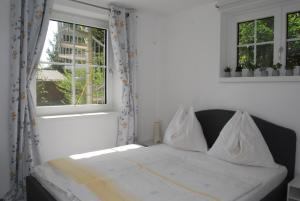 Postel nebo postele na pokoji v ubytování Ferienwohnung mit Pool in Wörthersee Nähe
