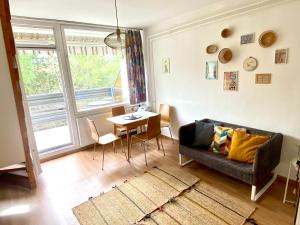 Posezení v ubytování Napsugár Retro Apartman
