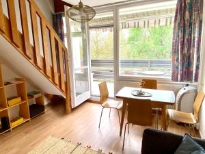 Posezení v ubytování Napsugár Retro Apartman