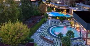 an overhead view of a swimming pool in a city at Hotel Terme Formentin in Abano Terme