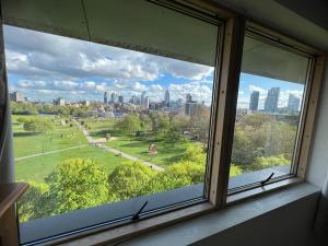 a window with a view of a city at 2 bed 2 Bath Luxury Apartment in Central London in London