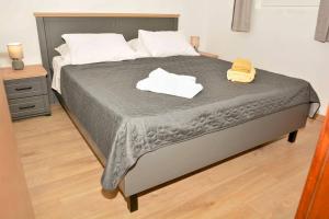 Apartman Stella客房内的一张或多张床位