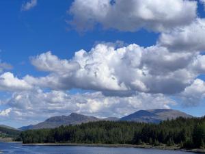 a view of a lake with mountains in the background at Balmacara Hotel in Kyle of Lochalsh