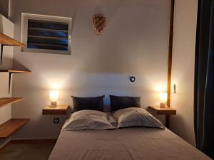 A bed or beds in a room at ZimZim
