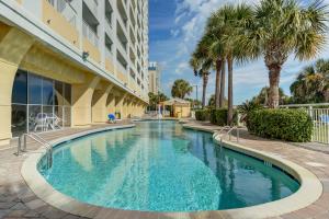 The swimming pool at or close to Oceanfront corner unit with panaramic views,pools,hot tub,lazy river,exercise room