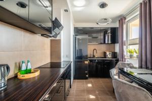Kuchyňa alebo kuchynka v ubytovaní Apartament Kaskada Parking & Balcony by Axel