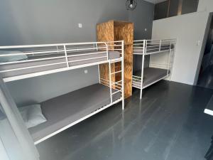 Posteľ alebo postele v izbe v ubytovaní Urban Rooms