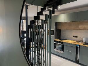 Η κουζίνα ή μικρή κουζίνα στο Logement N2 tout confort - proche de Giverny +24 φωτογραφίες