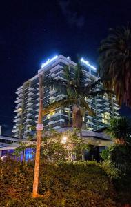 a building with lights on top of it at night at BETH Accommodations Westlands Nairobi in Nairobi