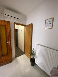 Postel nebo postele na pokoji v ubytování Apartmani Radosav
