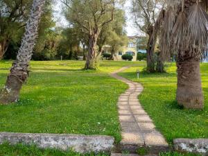 Κήπος έξω από το Corfiot Maisonette with shared Pool - Govino Bay