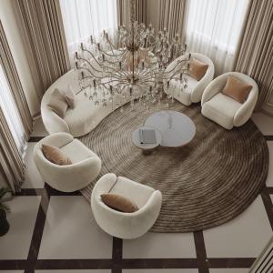 una sala de estar con sillas blancas y una lámpara de araña. en VIP Villa فيلا فاخرة, en Sheikh Zayed