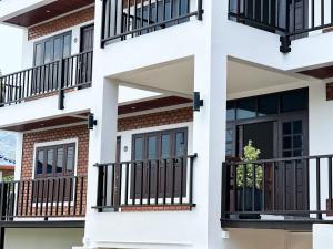 Balkón nebo terasa v ubytování Botanic Boutique Hotel Surin Beach